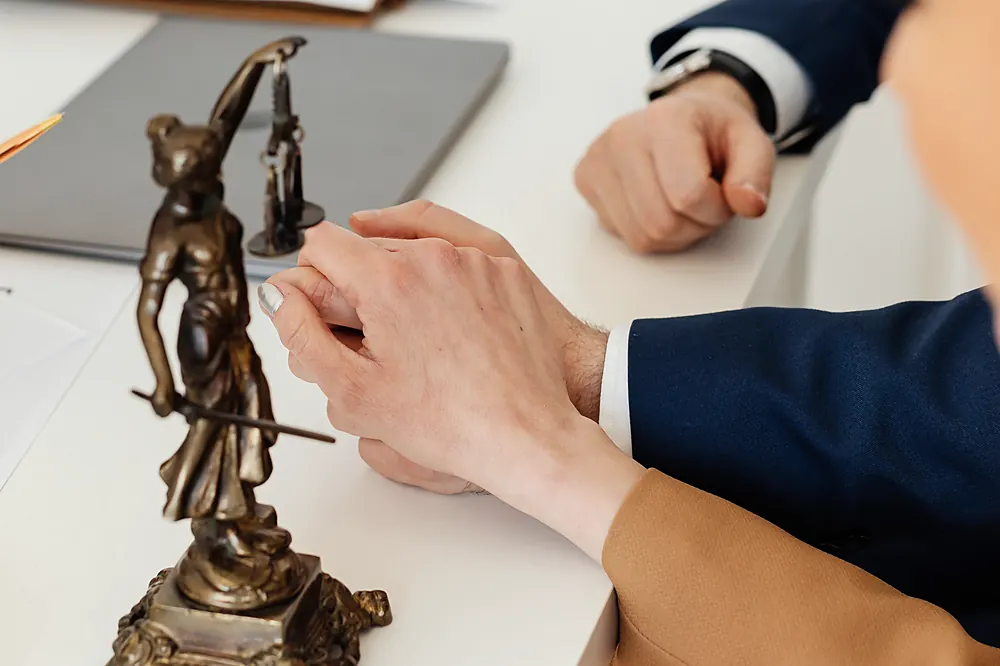 A consultation across a desk